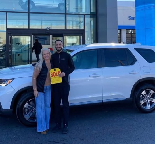Karen & Bill with their SUV