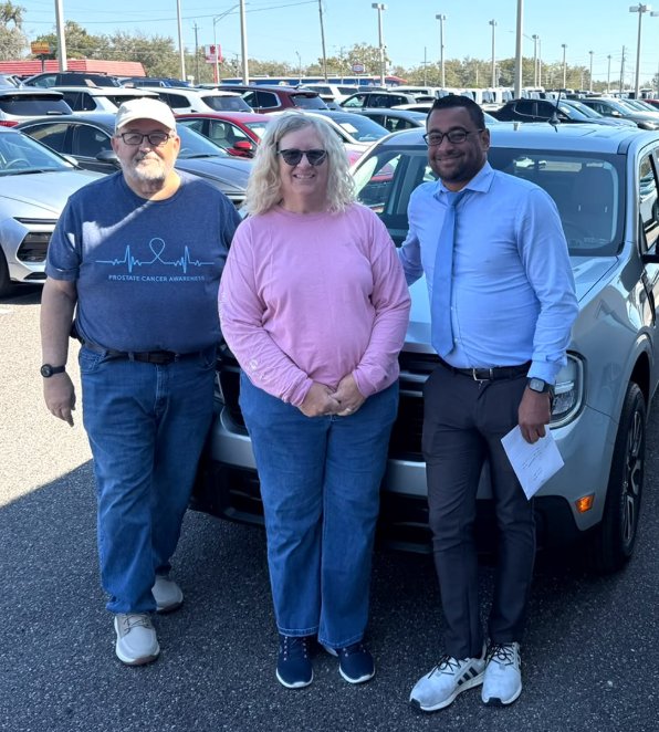 Greg & Sandra with their SUV